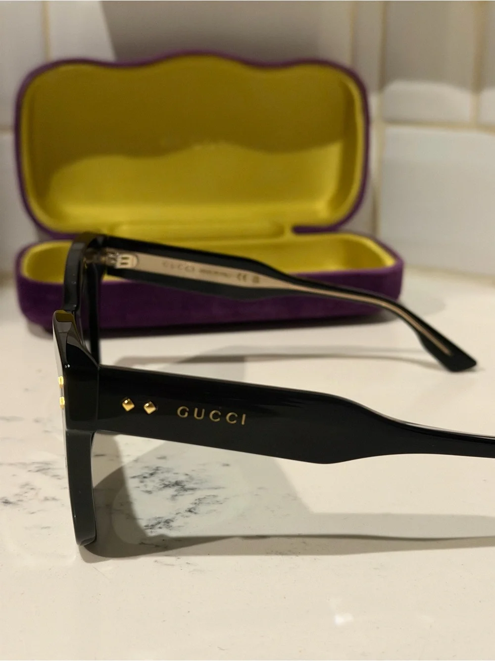 Gucci Black Frame Women's Sunglasses with Dark Lenses